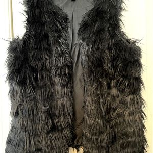 Black faux fur vest